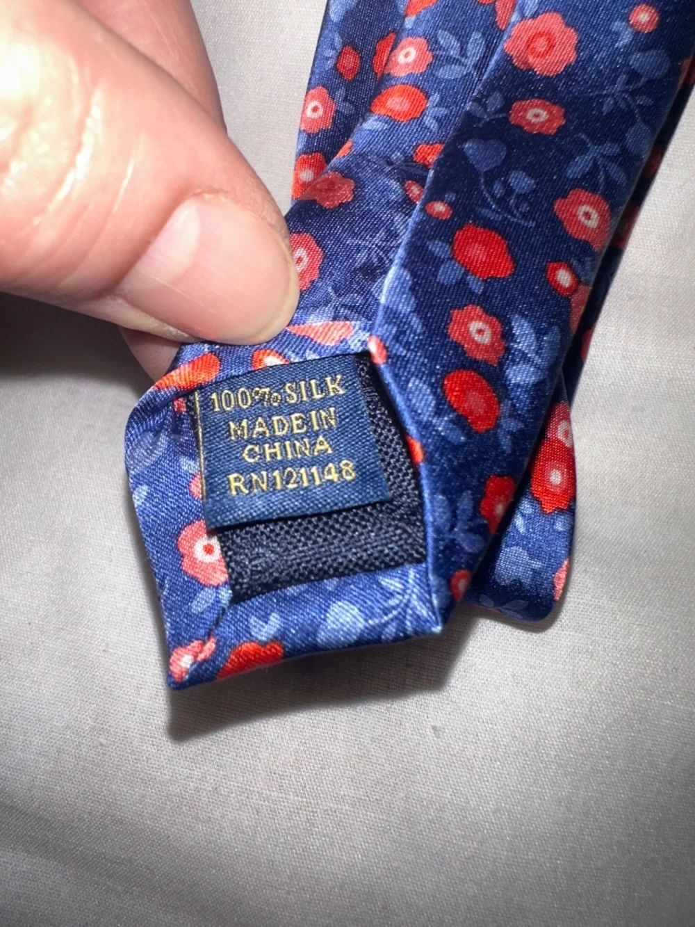 Club Room; navy, blue with red, little flowers